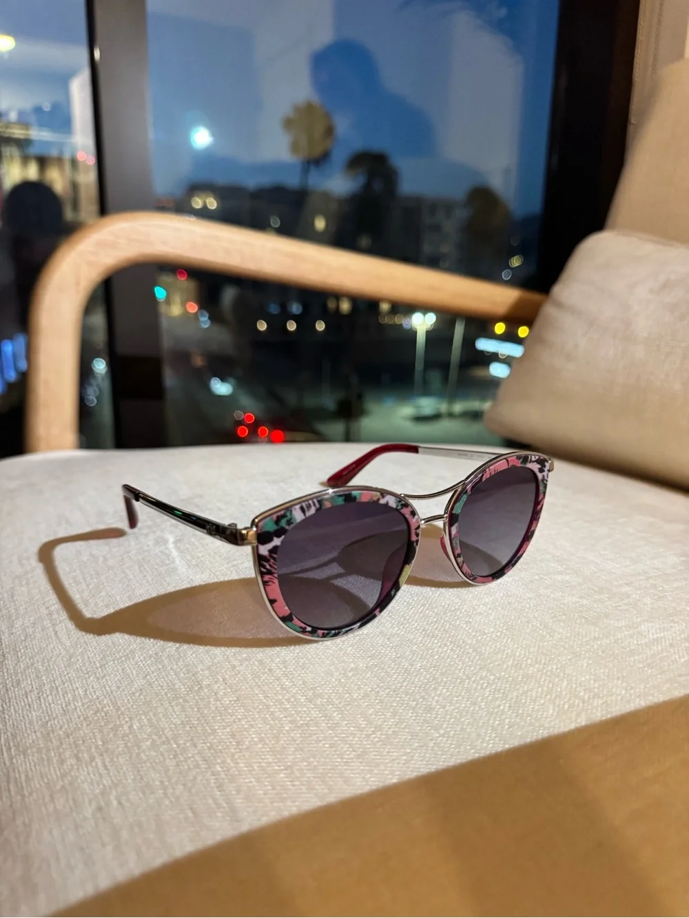 GUESS Pink Floral Cat-Eye Sunglasses with a silver bridge
